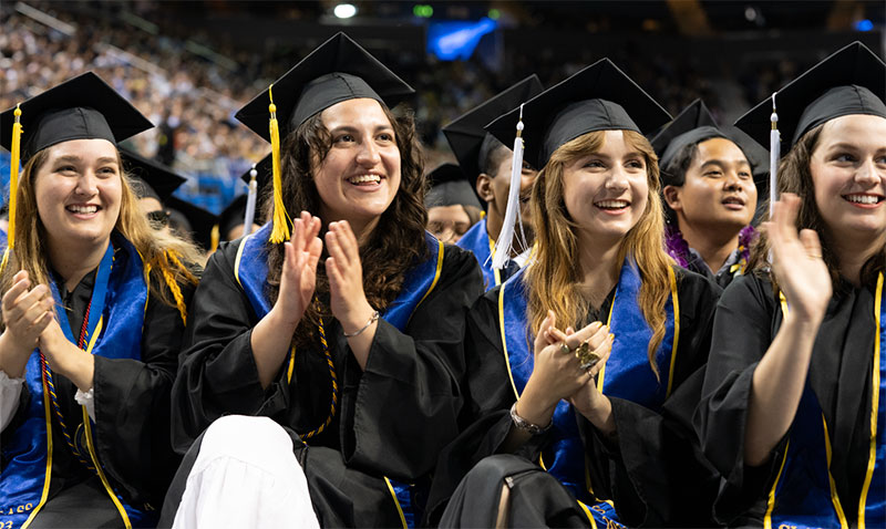 Bruins celebrate their achievement at commencement